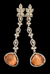 Orangish peachy ad earrings