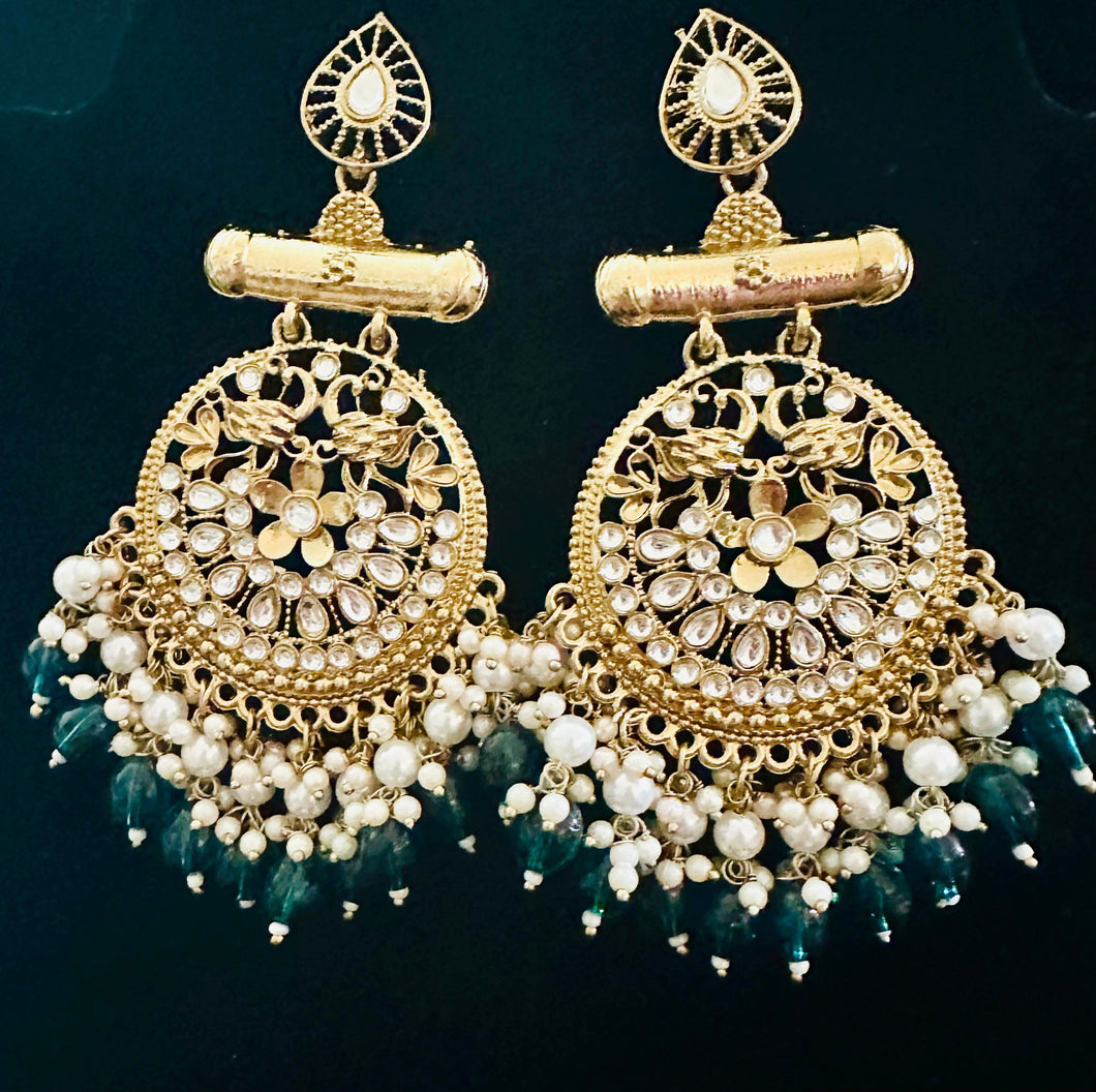 Emerald green kundan earrings